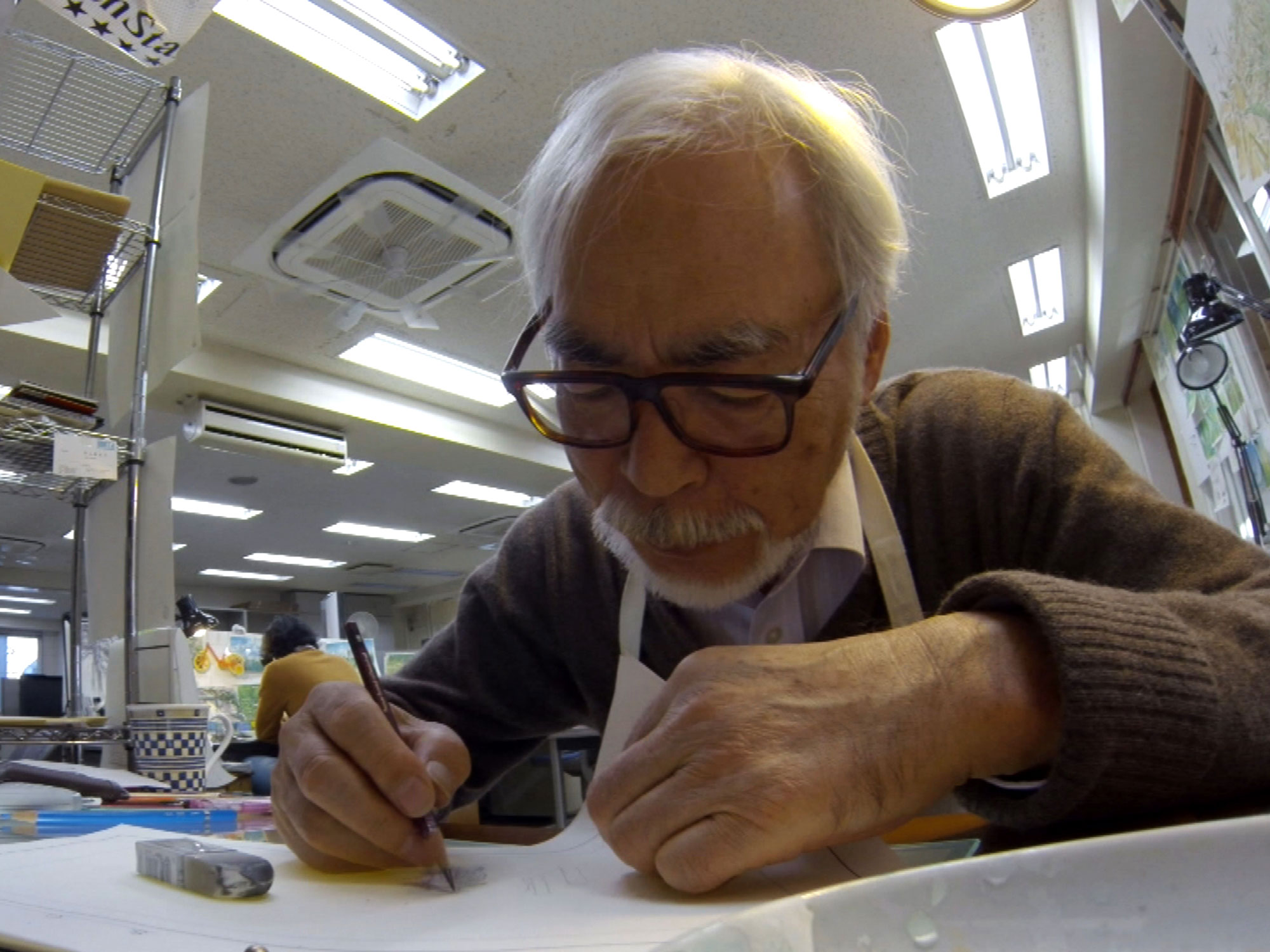 Hayao Miyazaki working in his studio